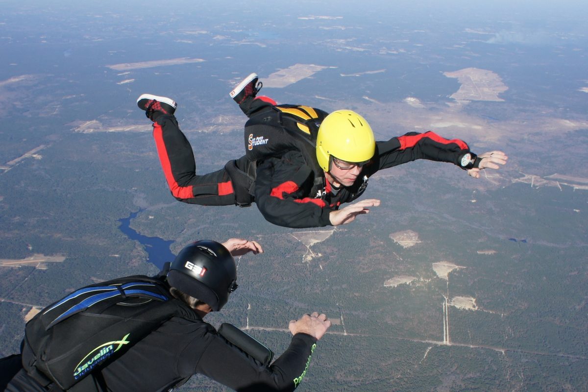 aff student wearing sun path student rig in freefall